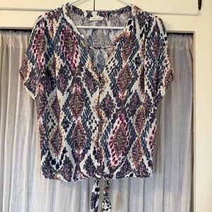 Lovestitch tie-front top with buttons.